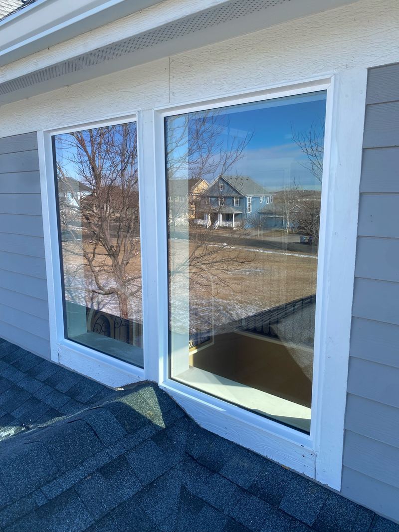 White-frame window in siding
